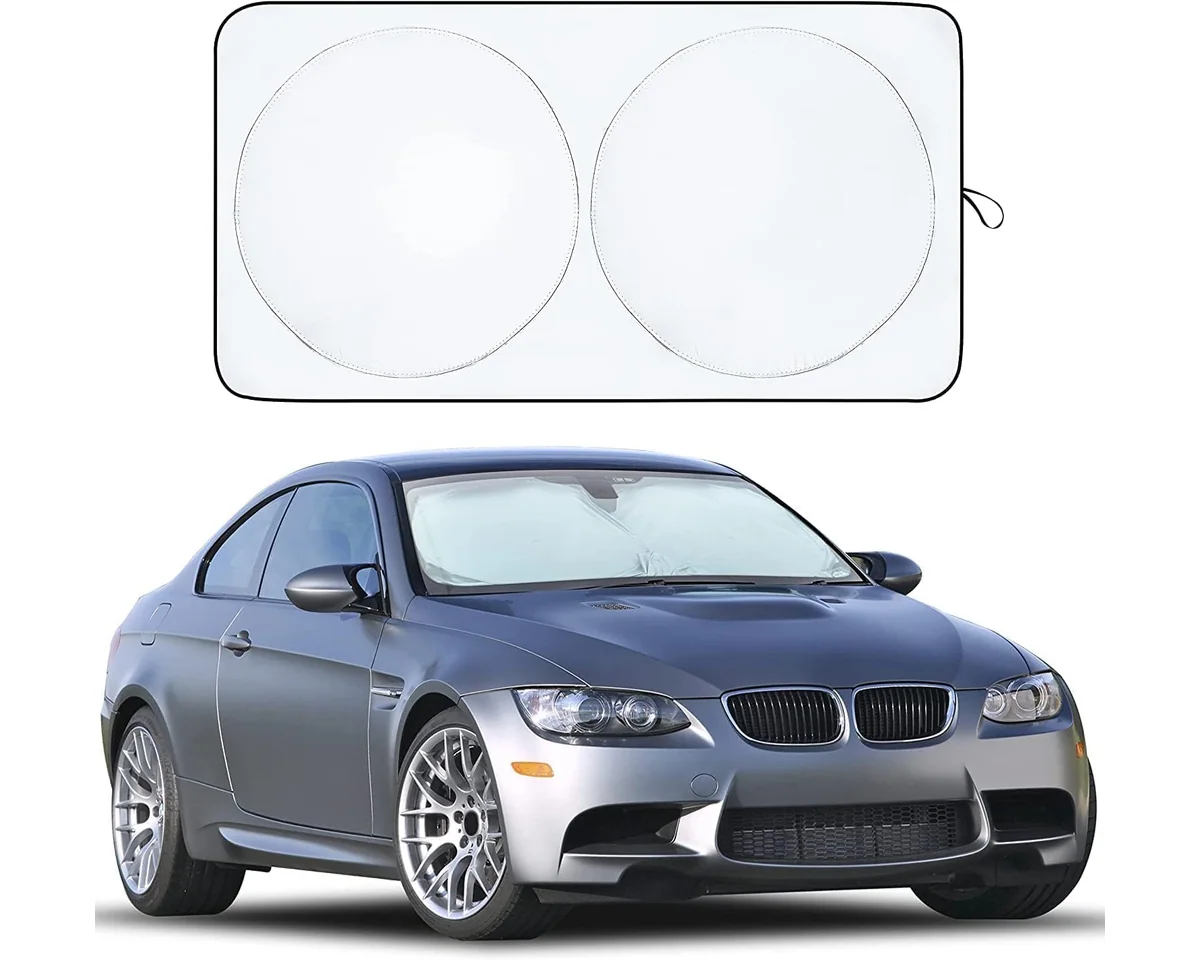 Foldable automotive windscreen sunshade as a packaged accessory example